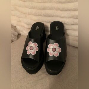 Platform shoes with flower detail size 8